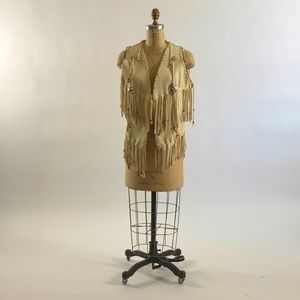 Western cream leather vest with silver conchae and beads and fringe